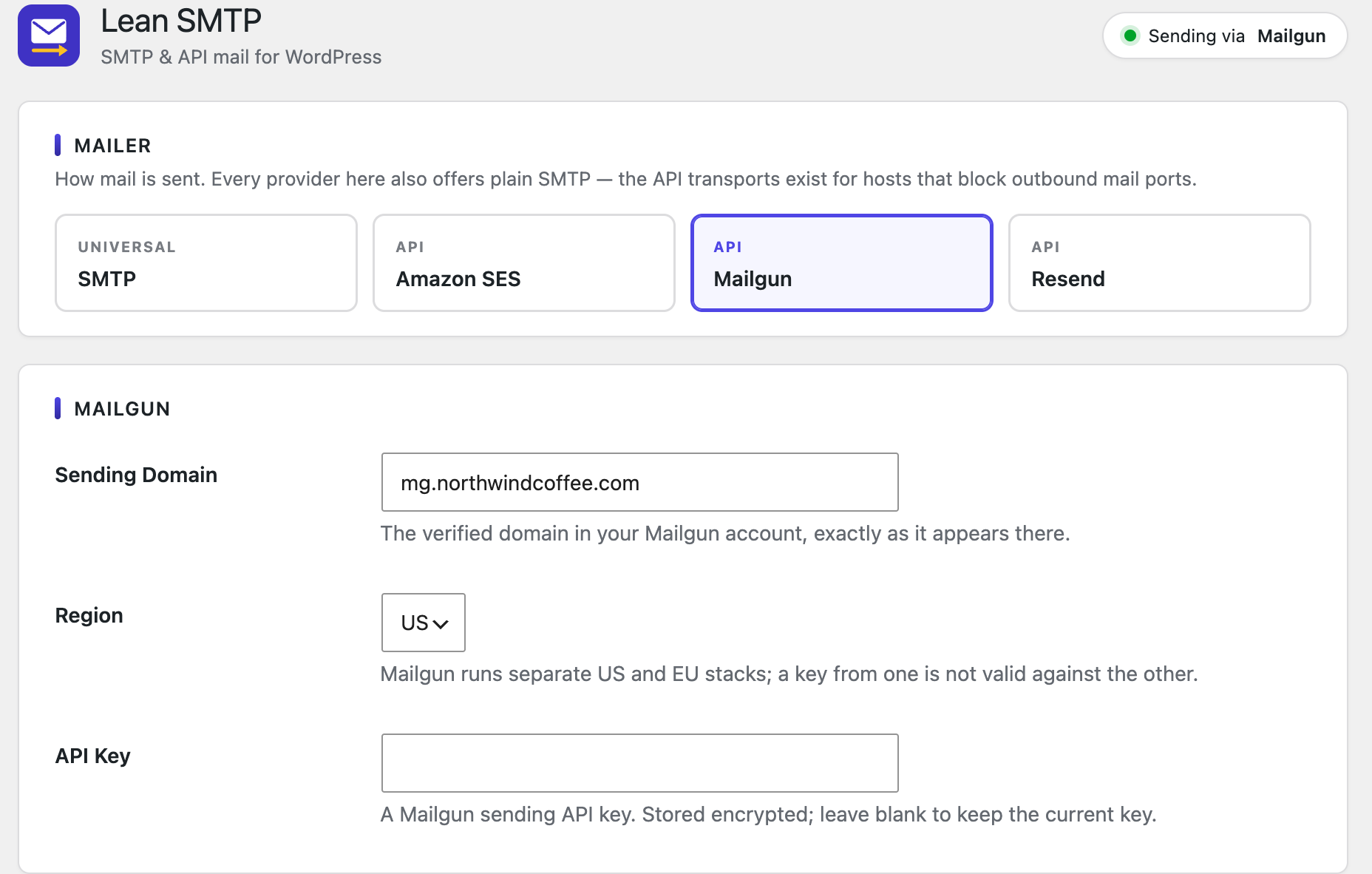 Mailgun settings: sending domain, US or EU region, and API key.